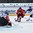 ZUG, SWITZERLAND - APRIL 17: Finland's Veini Vehvilainen #1 makes the save against Switzerland's Dominik Volejnicek #10 while Vili Saarijarvi #9 defends during preliminary round action at the 2015 IIHF Ice Hockey U18 World Championship. (Photo by Francois Laplante/HHOF-IIHF Images)